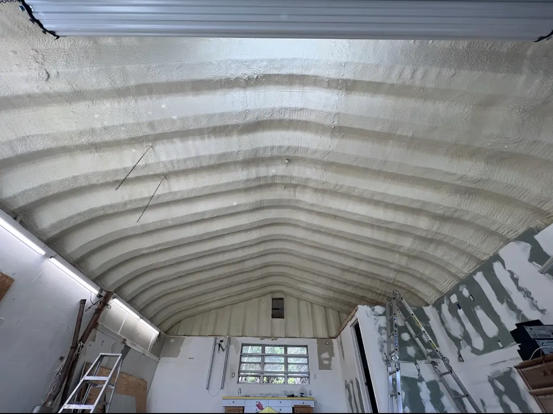 Spray polyurethane foam applied to the underside of a metal roof deck in Ontario